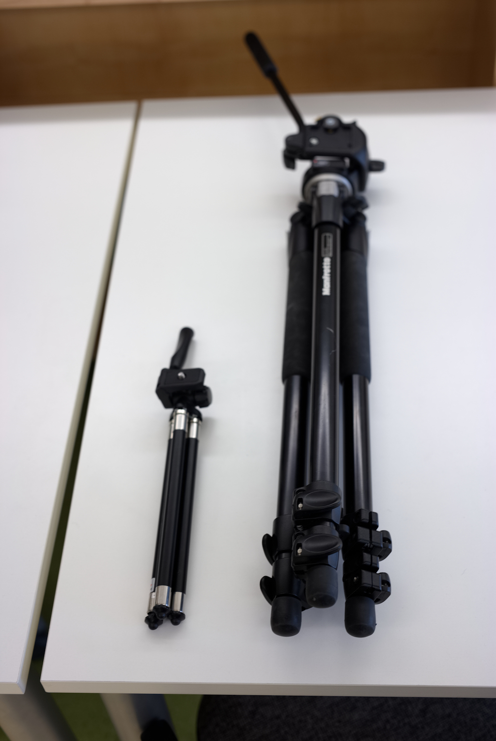 A picture of two tripods on a table