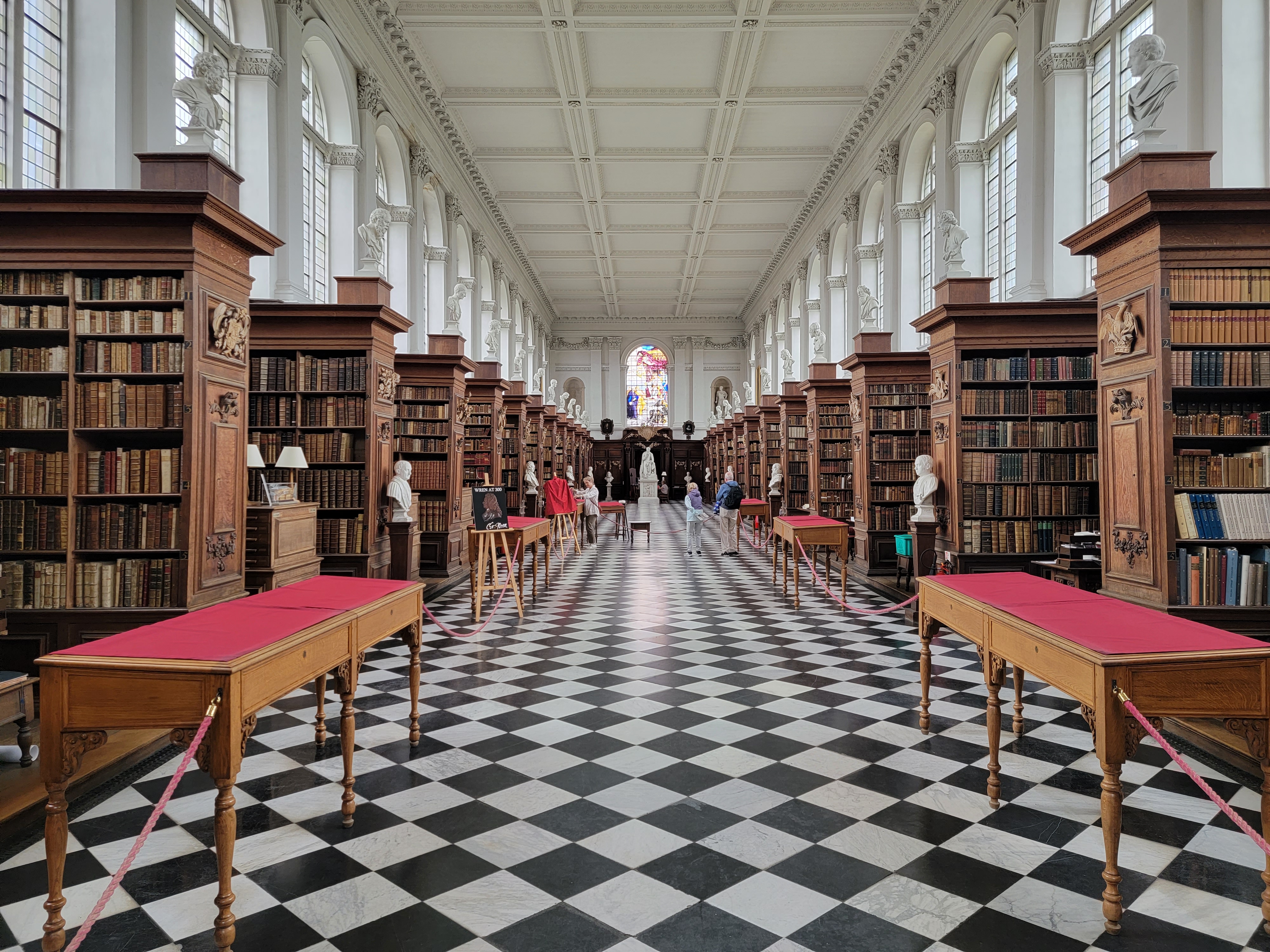 The interior of the Wren Library, taken from the entrance and facing towards the statue of Byron.